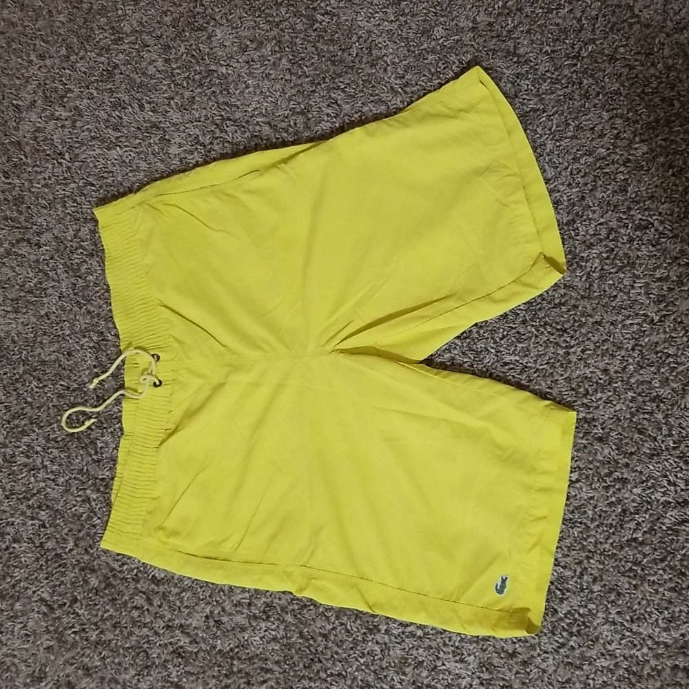 Lacoste yellow short size M